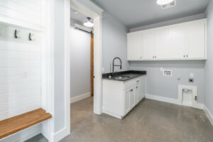 Custom home interiors - laundry and mud room with sink