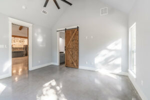 Custom home bedroom - sliding barn door