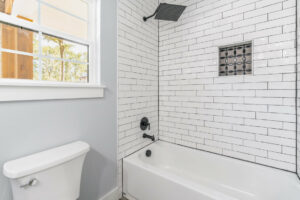 Custom home bathroom - rain shower and tile tub