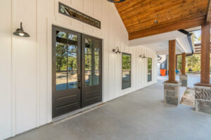 Custom home exterior front door covered entryway