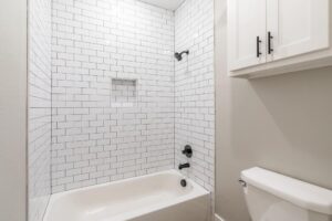 Custom Bathroom - tiled tub with shower