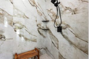 Marbled walls in standing shower