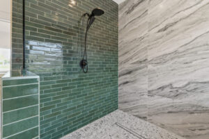 Green Tile with marble shower - FM 275 new house built by LaRue Custom Homes