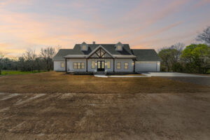 New house with front porch and patio cover - FM 275 new house built by LaRue Custom Homes