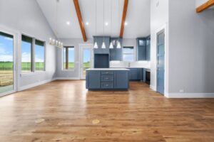 Custom kitchen with a wooden beam ceiling and pendant light fixtures